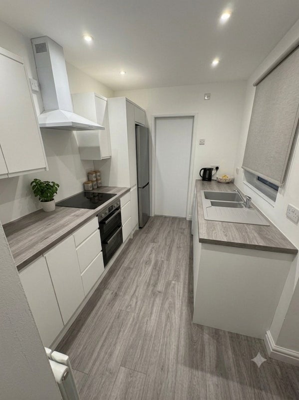 Photo 1: Shared Kitchen