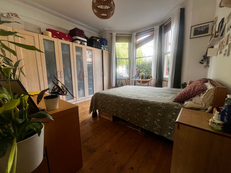 Photo 1: A lovely bedroom with plenty of storage