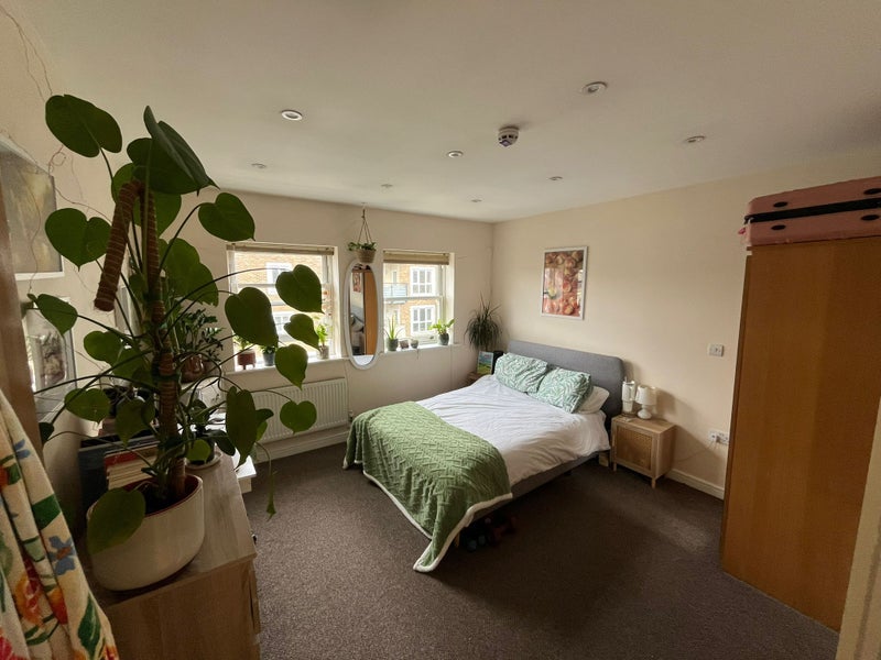 Photo 1: Bedroom -- Note some of the decor and furniture will be gone
