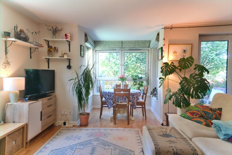 Photo 1: Bright living room