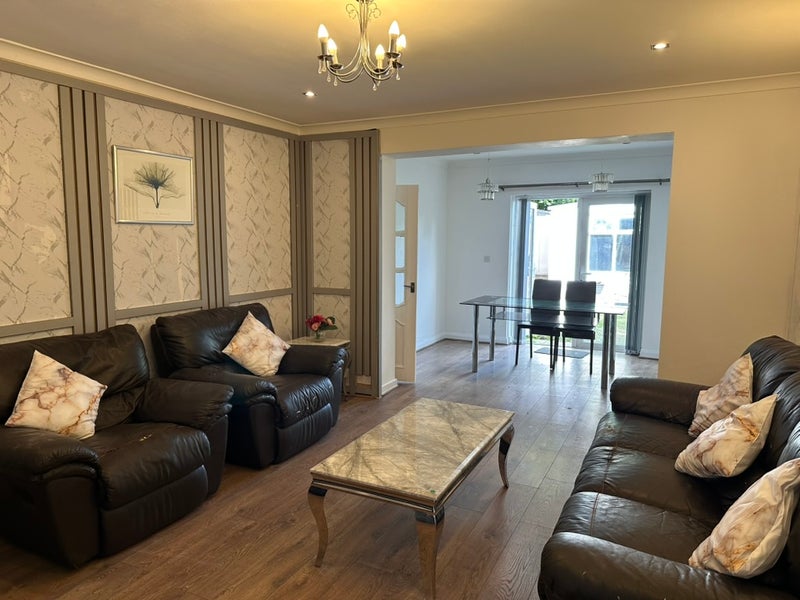 Photo 1: Shared living area