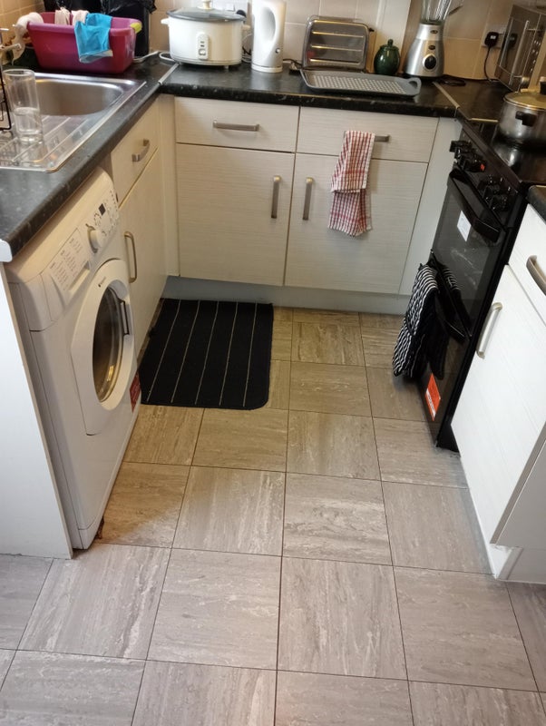Photo 1: Washing machine and cooker