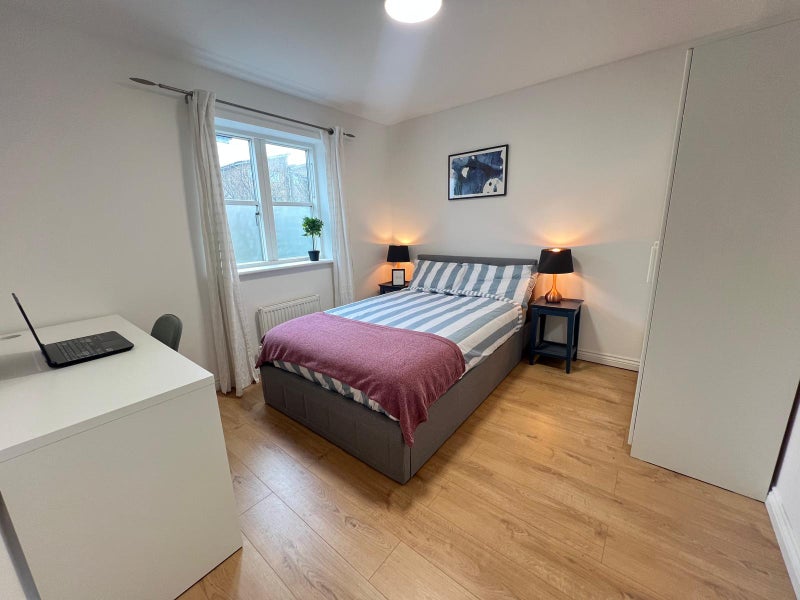 Photo 1: Your room comes furnished with the double bed with storage, two bedsides, wardrobe and desk with cha
