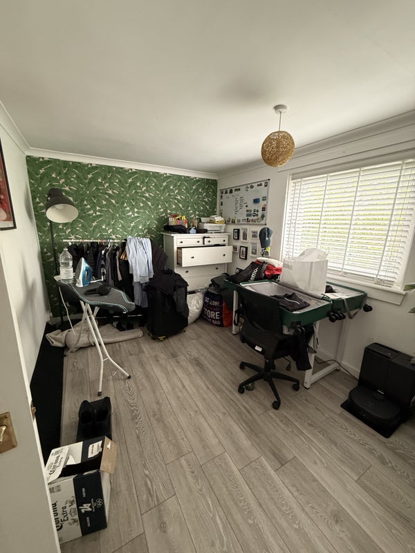 Photo 1: This is the spare room which is in the process of being emptied
