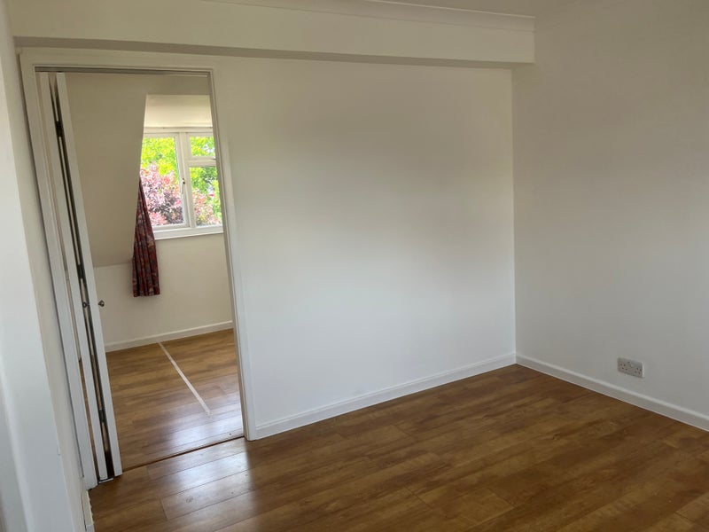 Photo 1: Open plan living room. Door Entrance to bedroom 