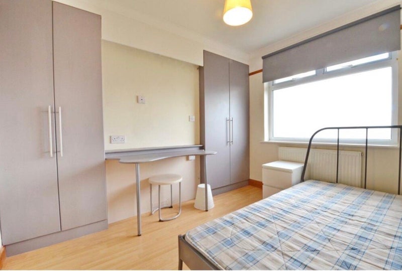 Photo 1: Double-bed with storage and desk included.