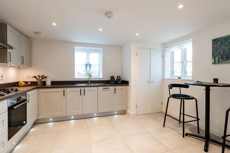 Photo 1: Kitchen & Dining Space