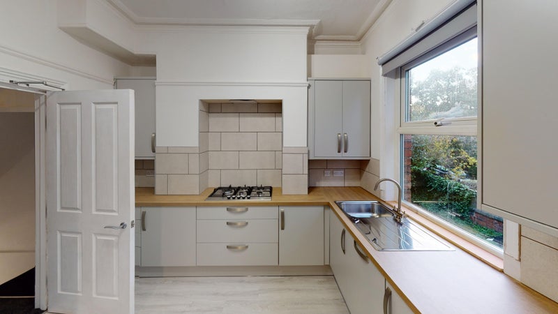 Photo 1: Kitchen