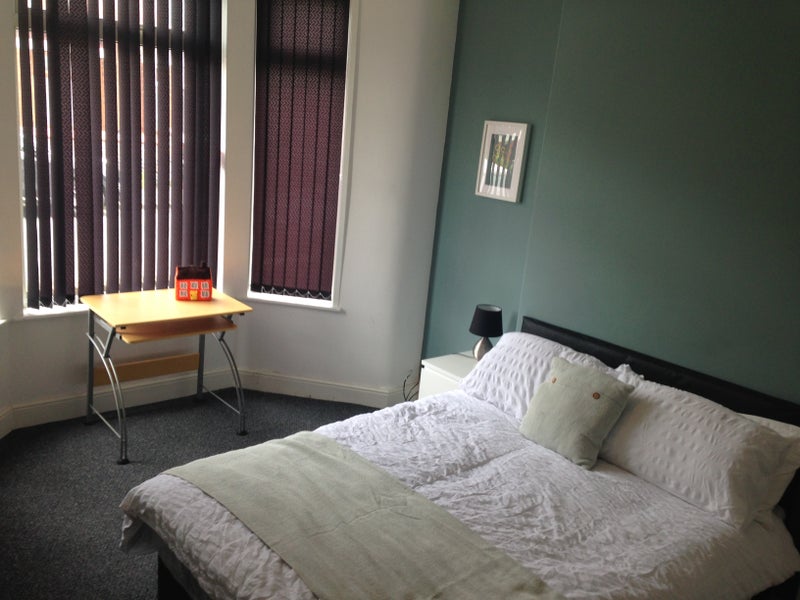 Photo 1: Bedroom 1 - Image 1 - Ground floor front of house