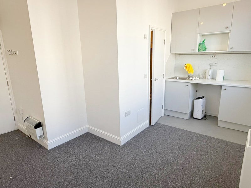 Photo 1: Open Plan kitchenette/ Living area 