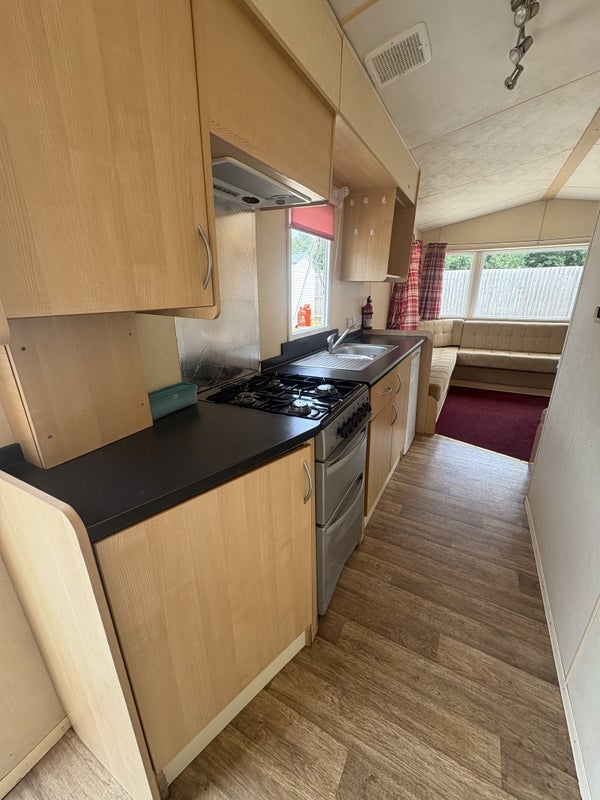 Photo 1: Kitchen area