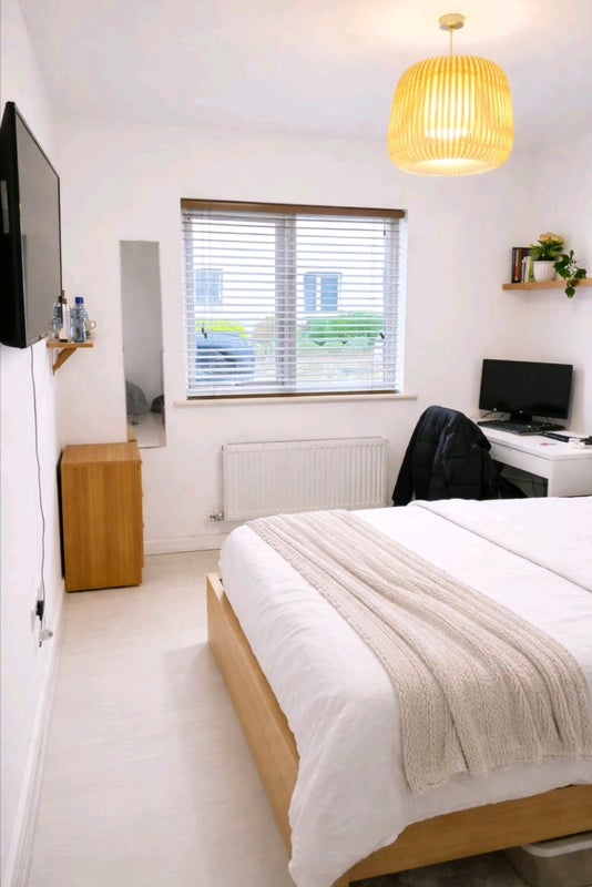 Photo 1: Double Bedroom - Double Bed, Desk, Cupboard, Side Table/Drawers