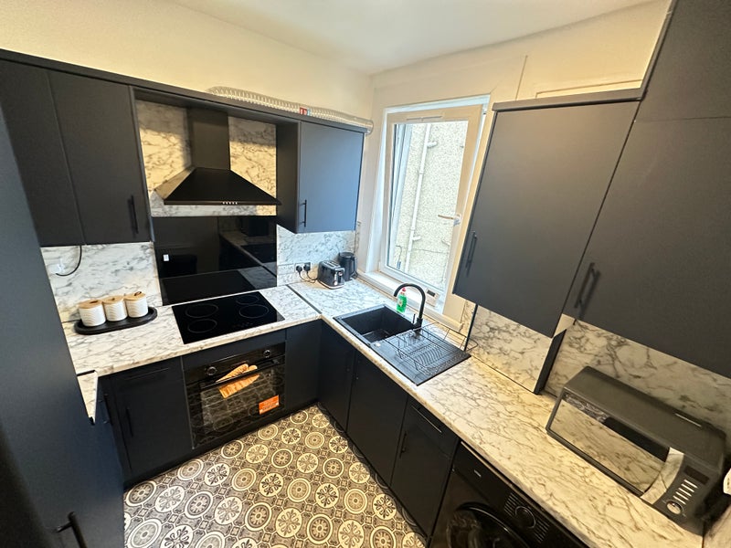 Photo 1: Kitchen