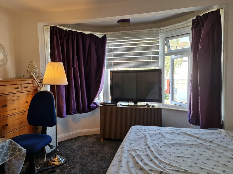 Photo 1: bedroom -double bed facing tv and window