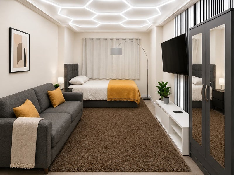 Photo 1: Bedroom/Living Space