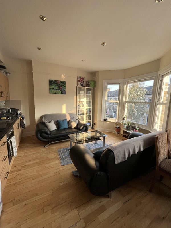 Photo 1: Kitchen and Communal Area