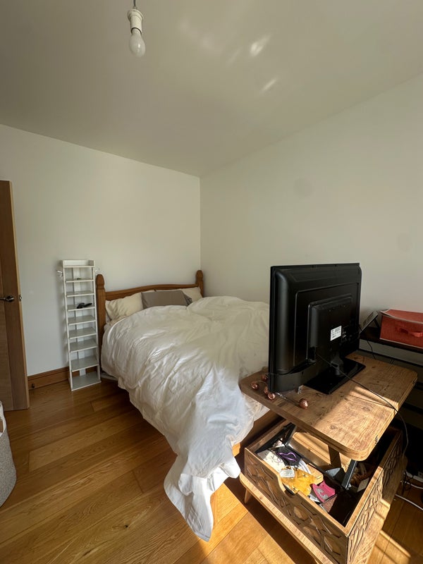 Photo 1: Brand new or freshly washed bedding and storage on the shelf. There’s a power strip to the shelf.