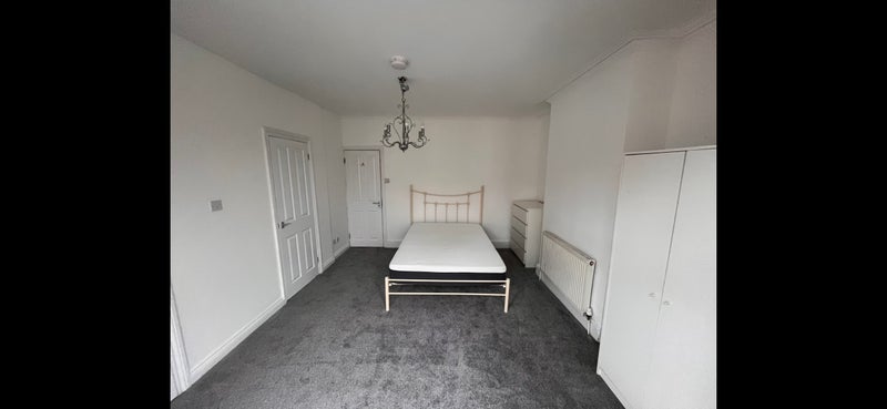 Photo 1: 1st Bedroom 