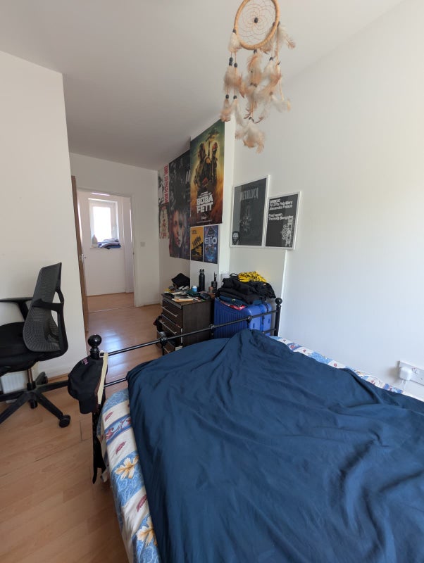 Photo 1: Double Bedroom with computer desk on the side