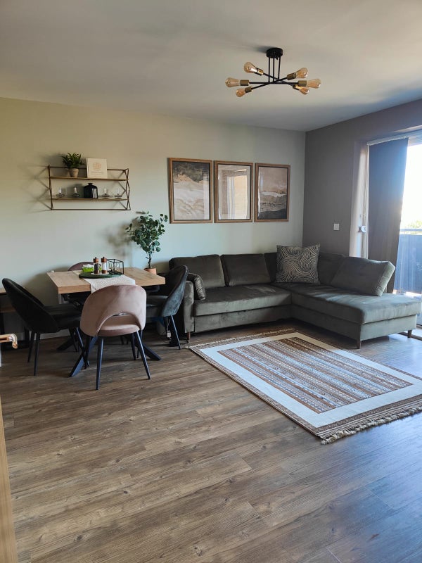 Photo 1: Open Living room and kitchen on to balcony