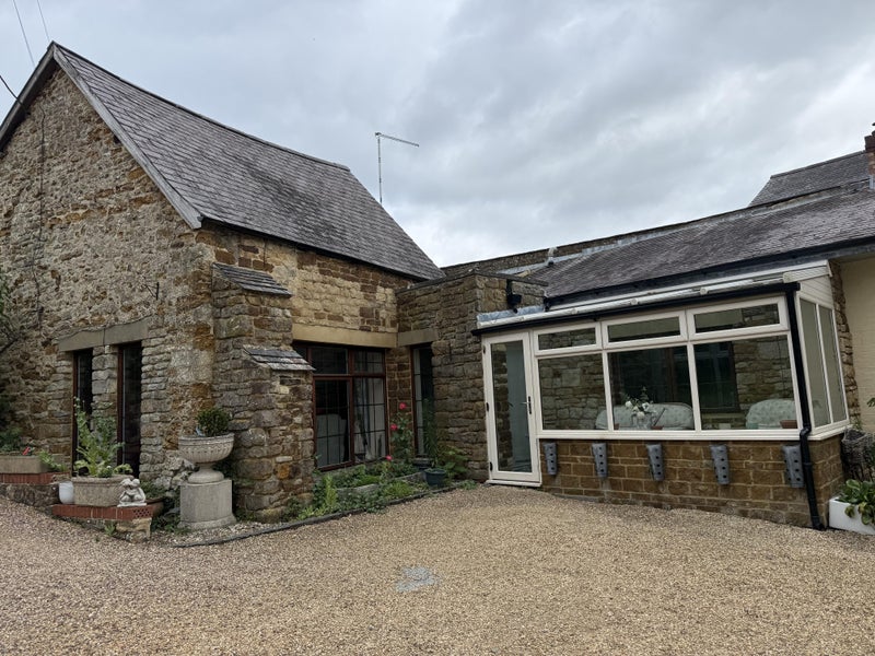 Photo 1: Annexe and conservatory 