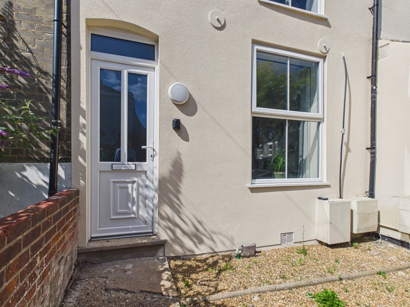 Photo 1: House Front