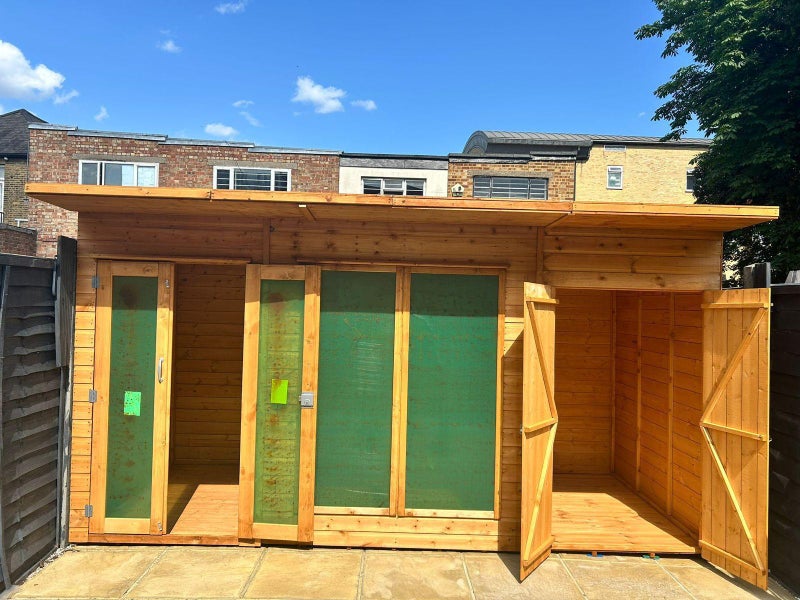 Photo 1: Backyard store room