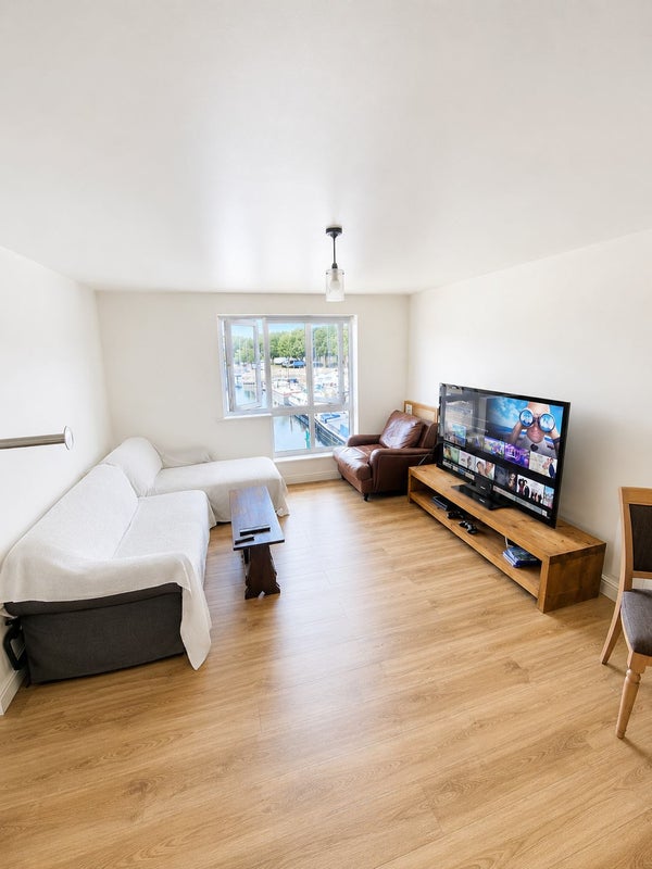 Photo 1: The living and dining space