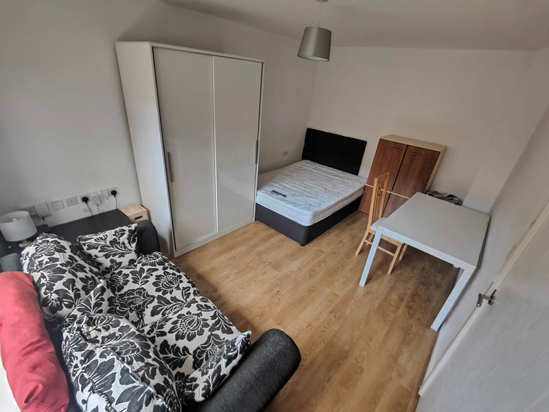 Photo 1: Double bedroom ,furnished with double bed, sofa area, wardrobe