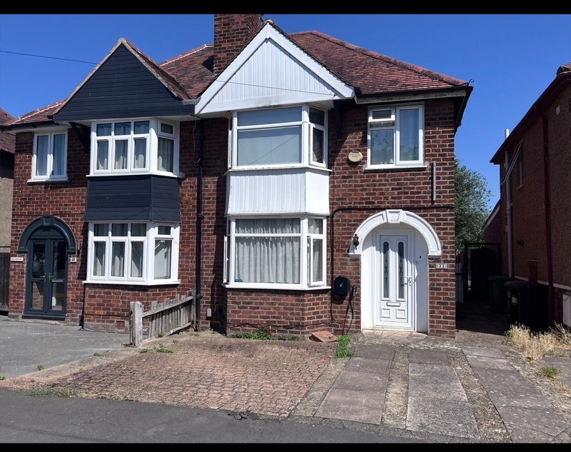 Photo 1: Front of house 