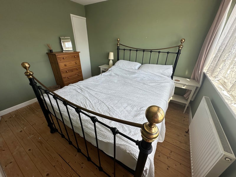 Photo 1: Double bedroom with kingsize bed and storage