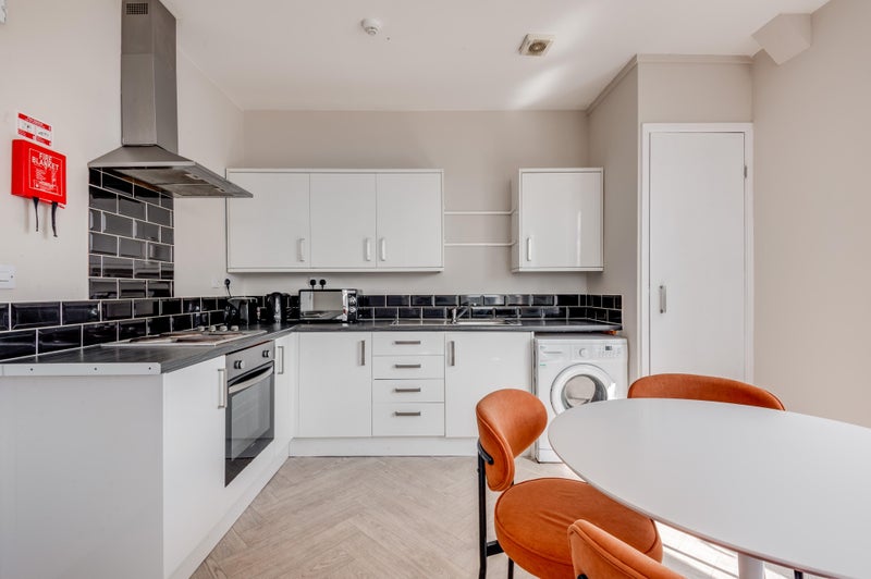 Photo 1: Kitchen