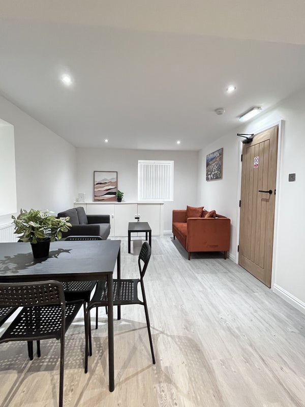 Photo 1: Living Dining Area