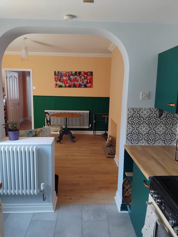 Photo 1: Dining area that leads into kitchen, new floors and decorated