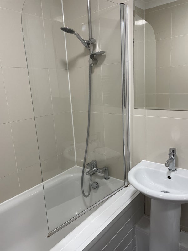 Photo 1: Shower over bath