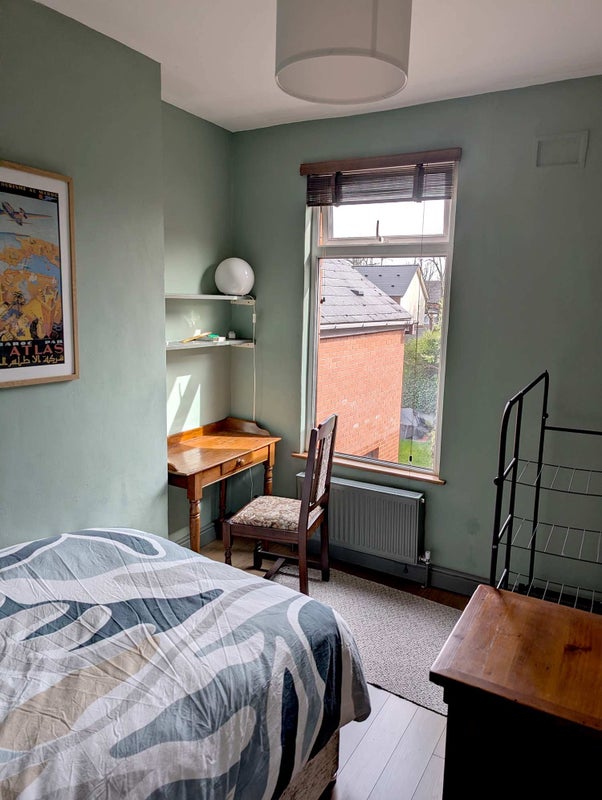 Photo 1: Light filled bedroom