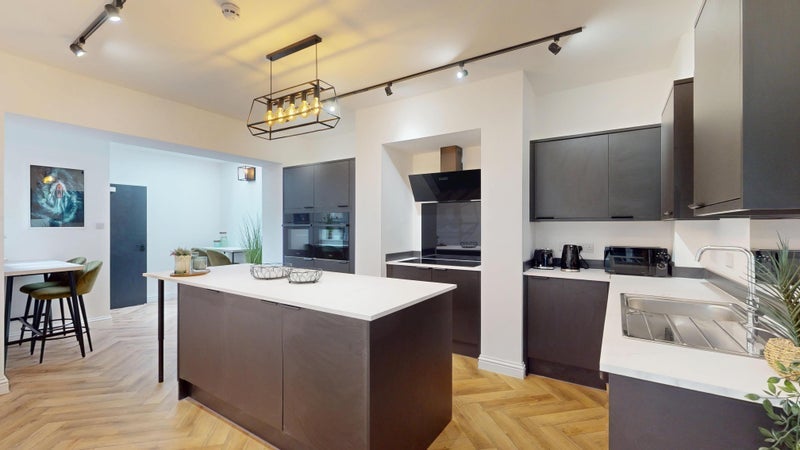 Photo 1: Ground floor kitchen