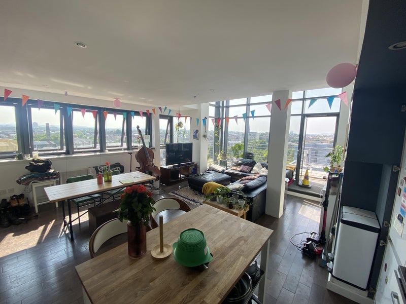 Photo 1: Kitchen/Living Area