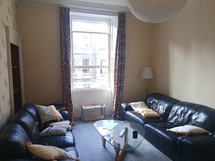 Photo 1: living room! there is a small table as well