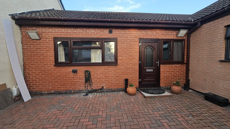 Photo 1: Front door and patio 