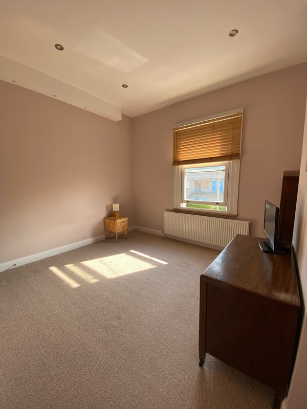Photo 1: The bedroom! Bright and airy. Pending bed frame and matress, unless you have your own. 