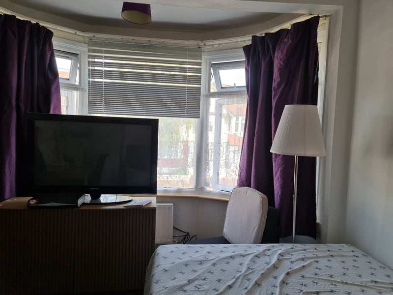 Photo 1: Matter bedroom/tv