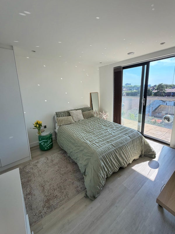 Photo 1: Double bedroom & balcony
