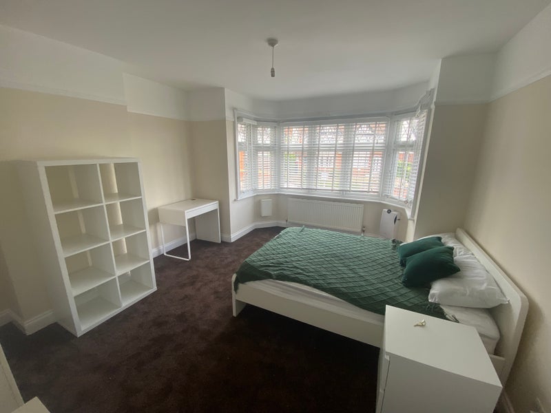 Photo 1: Larger front bedroom