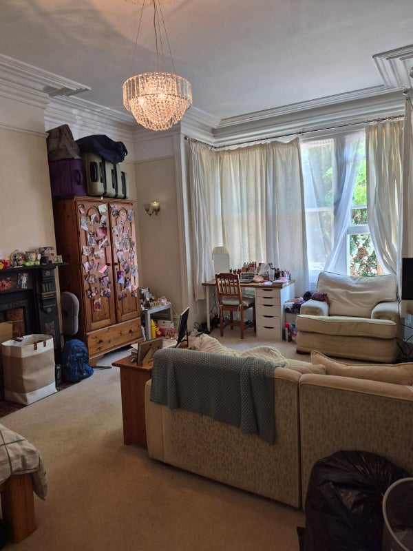 Photo 1: seating area wardrobe bay window and desk