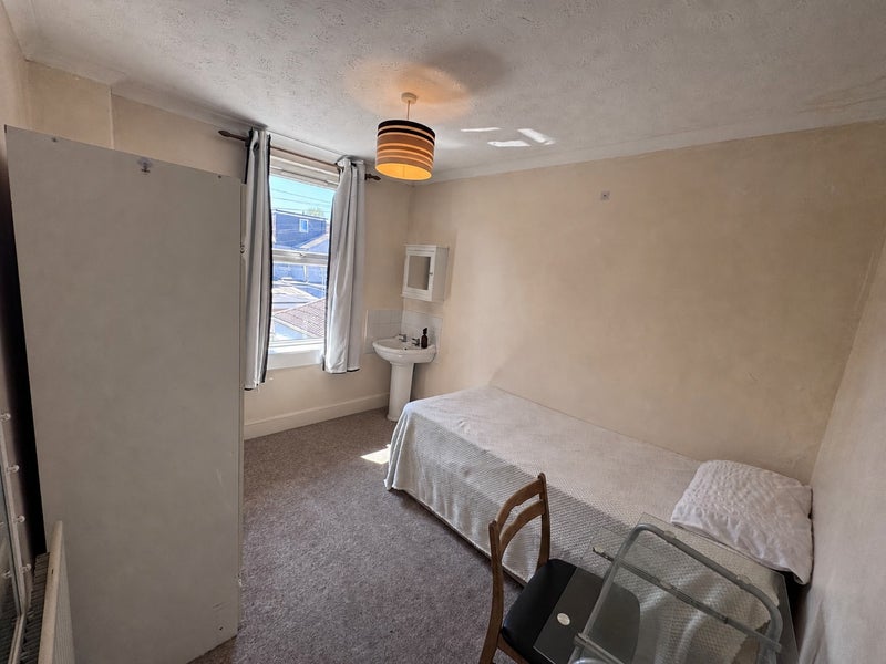Photo 1: Single Bed