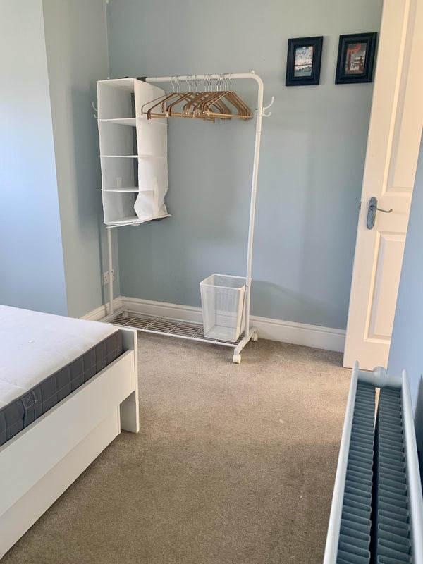 Photo 1: Hanging rail with storage