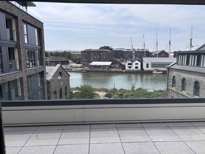 Photo 1: Harbour facing terrace