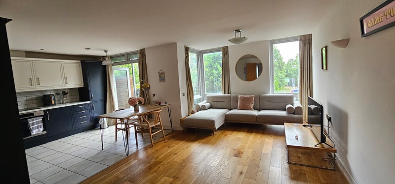 Photo 1: Lounge and kitchen