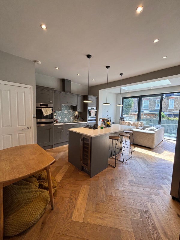 Photo 1: Kitchen/Living Space